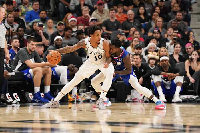 Nov 29, 2019; San Antonio, TX, USA; San Antonio Spurs guard DeMar DeRozan (10) backs in against LA Clippers guard Patrick Beverley (21) during the second half at the AT&T Center. Mandatory Credit: Daniel Dunn-USA TODAY Sports